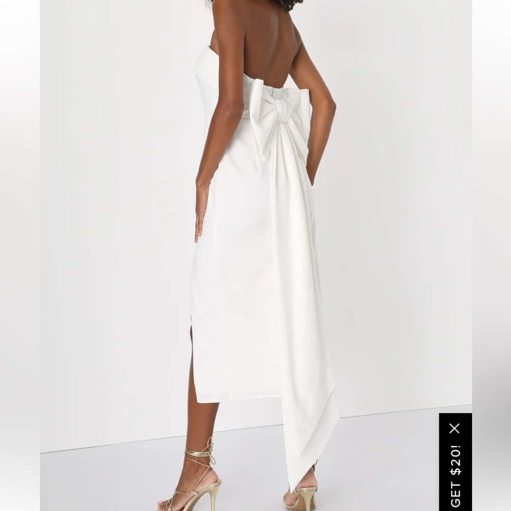 NWT Brand New, Never Worn, Currently sold out, White Lulu’s Bow Midi Dress